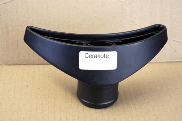 die casted component with a cerakote surface finish die casted component with a cerakote surface finish